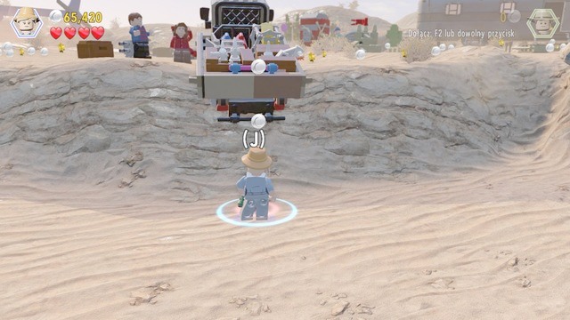 After you have smashed all of the objects, as Ellie, approach the truck shown in the screenshot and take a jump to scatter the bricks on the bed of the truck - Prologue | Jurassic Park - walkthrough - Jurassic Park - walkthrough - LEGO Jurassic World Game Guide & Walkthrough