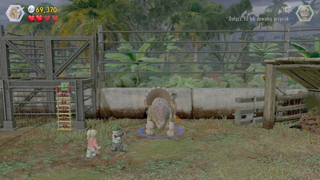 After you open the gate, switch to the triceratops and approach the orange element shown in the screenshot - Welcome to Jurassic Park | Jurassic Park - walkthrough - Jurassic Park - walkthrough - LEGO Jurassic World Game Guide & Walkthrough