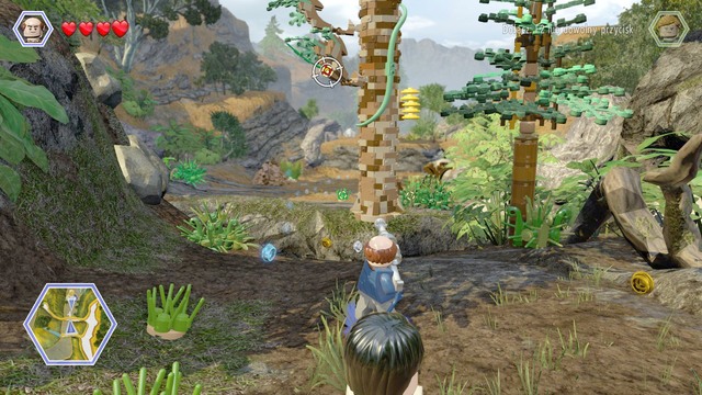 At the next obstacle, which you can see in the screenshot, switch to Eddie and fire the weapon at the target, to release the rope - InGen Arrival | Jurassic Park - The Lost World - walkthrough - Jurassic Park - The Lost World - walkthrough - LEGO Jurassic World Game Guide & Walkthrough