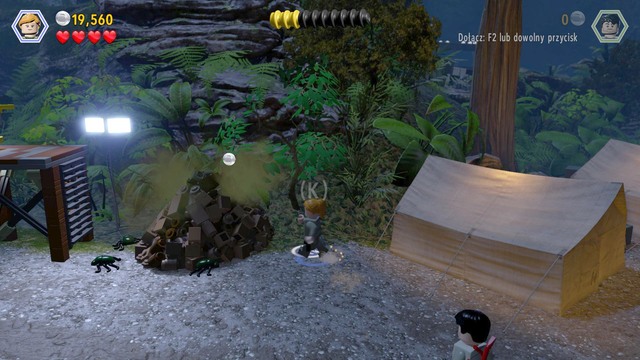 After you fight back the InGen, as Sarah, approach the feces next to the tent, dig up the horn and return to the dinosaur - InGen Arrival | Jurassic Park - The Lost World - walkthrough - Jurassic Park - The Lost World - walkthrough - LEGO Jurassic World Game Guide & Walkthrough