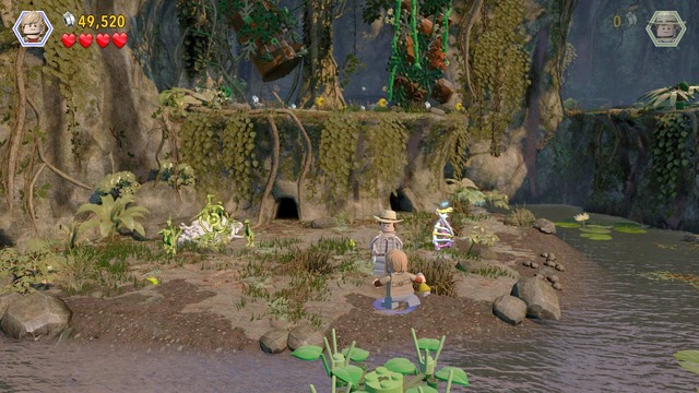 Jump over the water, switch to Eric and throw the tyrannosaur scent towards the dinosaurs to drive them away - Eric Kirby | Jurassic Park III - walkthrough - Jurassic Park III - walkthrough - LEGO Jurassic World Game Guide & Walkthrough