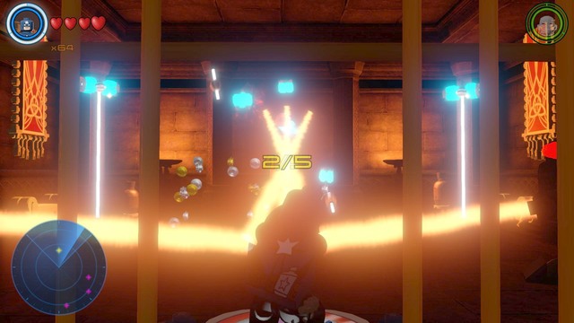 Use the platform to point the laser at the five power generators shown on the picture (the blue objects under the ceiling) - Golden bricks - Asgard - secrets - LEGO Marvels Avengers - Game Guide and Walkthrough