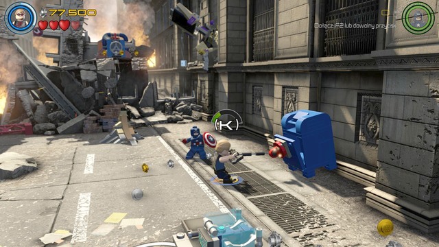 You can obtain the second character by opening the blue mailbox shown on the picture - Characters - Earths Mightiest - secrets - LEGO Marvels Avengers - Game Guide and Walkthrough