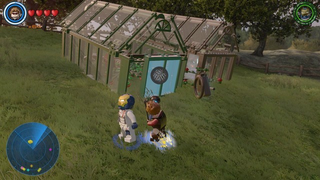 On the right side of the farm you will find two glass houses - Golden bricks - Bartons Farm - secrets - LEGO Marvels Avengers - Game Guide and Walkthrough