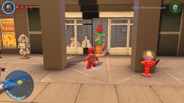 On the left side from the skyscraper on which you found brick number 19 you will find a shop - Golden bricks - North Manhattan - secrets - LEGO Marvels Avengers - Game Guide and Walkthrough