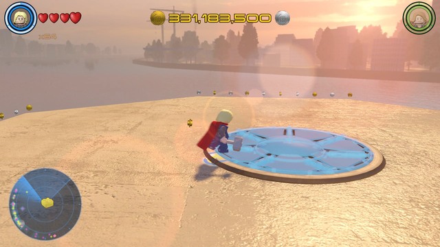 On the roof of the same building you will find a glass cover and another golden brick under it - Golden bricks - Southern Manhattan - secrets - LEGO Marvels Avengers - Game Guide and Walkthrough