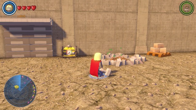 On the other side of the building you will find a pile of ground from which you must dig up bricks as Squirrel Girl - Golden bricks - Southern Manhattan - secrets - LEGO Marvels Avengers - Game Guide and Walkthrough