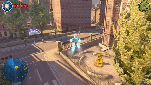 In the place shown on the picture, there is an area behind Hulks statue which you must scan as Iron Man - Golden bricks - Southern Manhattan - secrets - LEGO Marvels Avengers - Game Guide and Walkthrough