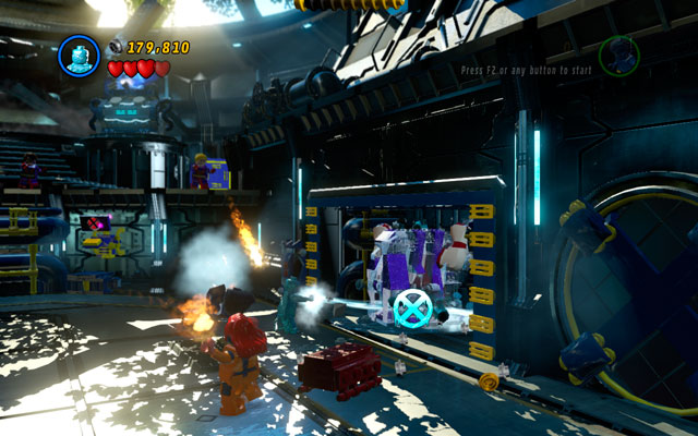 When the enemy is blinded, switch into Iceman and approach to the wall on the right so you can extinguish all fires - Juggernauts and Crosses | Walkthrough - Walkthrough - LEGO Marvel Super Heroes Game Guide & Walkthrough