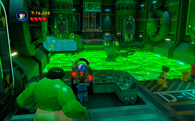 Head to the right, looking for the huge tank of acid - Hulk can pass through it, but other characters must find another way - Taking Liberties | Walkthrough - Walkthrough - LEGO Marvel Super Heroes Game Guide & Walkthrough