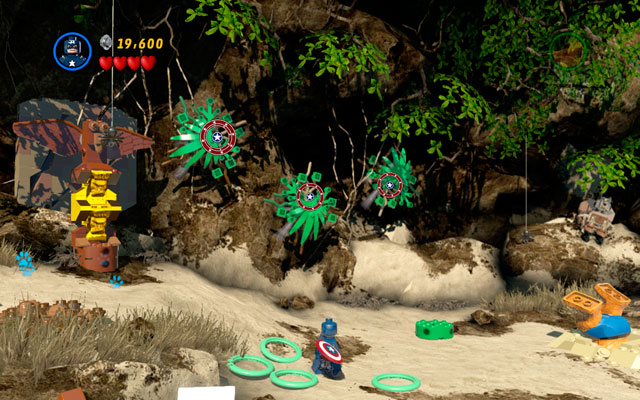 After the beginning of the mission choose Captain America and destroy a bush growing on the left side, then toss your shield at three plants located on the cliff - Rapturous Rise | Walkthrough - Walkthrough - LEGO Marvel Super Heroes Game Guide & Walkthrough