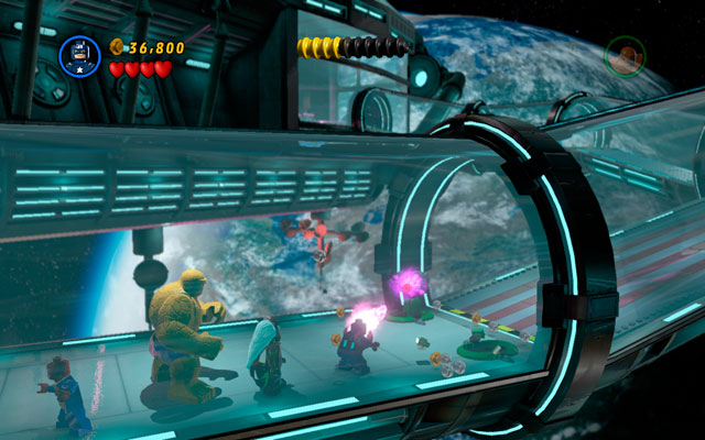 In new location switch into Captain America and cover yourself with a shield - in this way you will reflect the missiles to two deadly cannons, destroying them - A Doom With a View | Walkthrough - Walkthrough - LEGO Marvel Super Heroes Game Guide & Walkthrough
