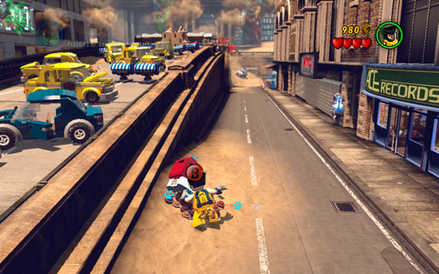 At the beginning of the stage jump down from the street and turn right, looking for the pizza motorcycle - dig it up with Wolverine - Sand Central Station | Minikit Sets - Minikit Sets - LEGO Marvel Super Heroes Game Guide & Walkthrough