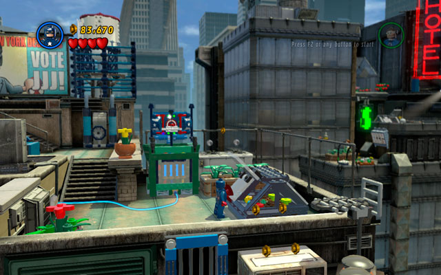 Second is located further, on the right side from the water silo, on the lower floor of the roof - Times Square Off | Minikit Sets - Minikit Sets - LEGO Marvel Super Heroes Game Guide & Walkthrough