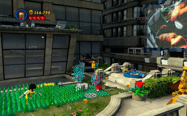 Standing near to the Spider-Mans billboard use Iron Mans rockets to detonate silver flowerbed - Times Square Off | Minikit Sets - Minikit Sets - LEGO Marvel Super Heroes Game Guide & Walkthrough