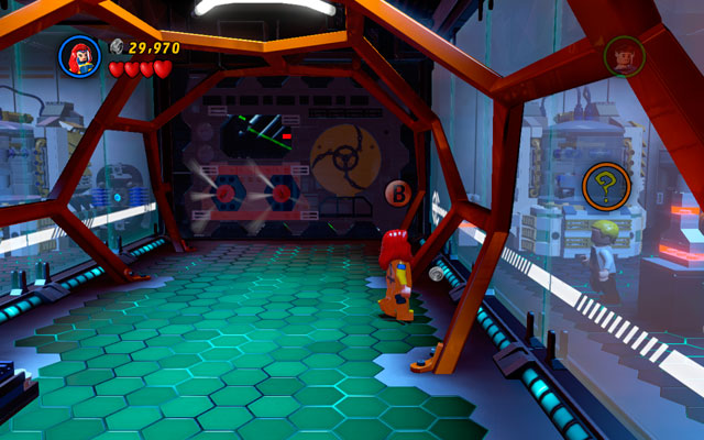 In the corridor located after the lift pit use Jean Greys telepathic abilities to take control over the scientist hidden on the right - Exploratory Laboratory | Minikit Sets - Minikit Sets - LEGO Marvel Super Heroes Game Guide & Walkthrough