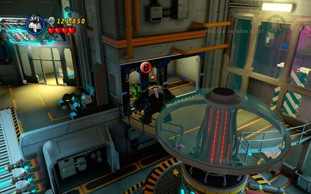 In the room with strange, rotary machine (on the left from the blue-and-white wall) choose any big character and yank the door located on the first floor, using green handles - Rebooted, Resuited | Minikit Sets - Minikit Sets - LEGO Marvel Super Heroes Game Guide & Walkthrough