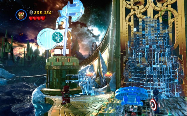 Switch into Iron Man and head to the second statue, destroying it with your rockets - Bifrosty Reception | Minikit Sets - Minikit Sets - LEGO Marvel Super Heroes Game Guide & Walkthrough