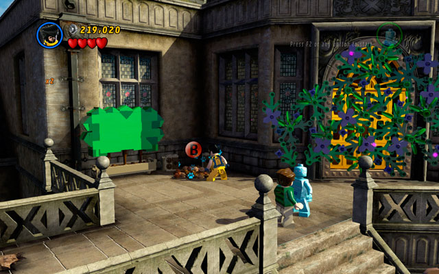 Stand near to the golden gate and switch into Wolverine to destroy all obstacles scattered on the left - Juggernauts and Crosses | Minikit Sets - Minikit Sets - LEGO Marvel Super Heroes Game Guide & Walkthrough