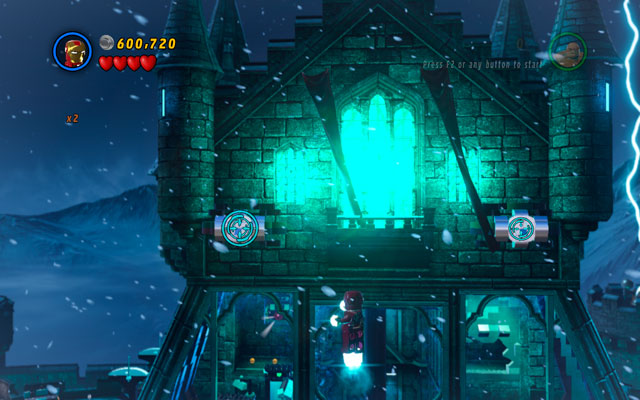 Fly up as Iron Man and shoot your rockets at two silver plates located on the tower of the castle - Doctor in the House | Minikit Sets - Minikit Sets - LEGO Marvel Super Heroes Game Guide & Walkthrough