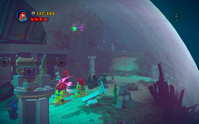 Right behind this location it is advisable to use Jean Greys ability to yank a green-and-violet tentacle sticking out from the building above - That Sinking Feeling | Minikit Sets - Minikit Sets - LEGO Marvel Super Heroes Game Guide & Walkthrough