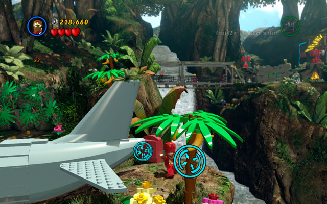 Second one is hidden behind the aeroplanes tail, at the slope - Rapturous Rise | Minikit Sets - Minikit Sets - LEGO Marvel Super Heroes Game Guide & Walkthrough