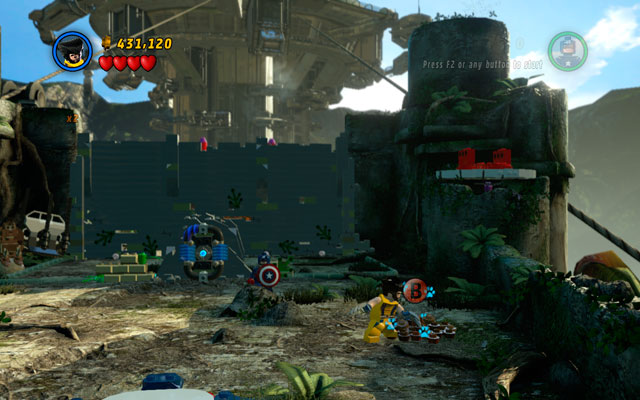 Third sand pile can be reached after destroying the first wall - Rapturous Rise | Minikit Sets - Minikit Sets - LEGO Marvel Super Heroes Game Guide & Walkthrough