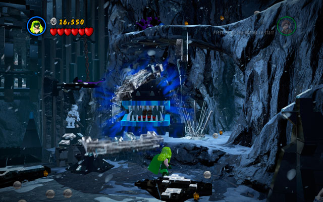 To rescue Stan Lee, choose Magneto or Polaris and - with their special powers - open the metal jaws placed on the right side of the gate - Deadpool Bonus Missions | Stan Lee in Peril - Stan Lee in Peril - LEGO Marvel Super Heroes Game Guide & Walkthrough