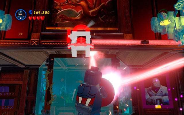 Rotate yourself to direct the laser beam on the red generator placed above the aquarium (with Kingpin hidden inside) - Feeling Fisky | Maps - Maps - LEGO Marvel Super Heroes Game Guide & Walkthrough