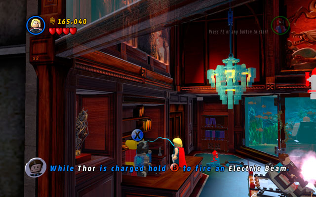 Turn left and find a battery placed behind the counter - Feeling Fisky | Deadpool Bonus Missions: Collectables - Deadpool Bonus Missions: Collectables - LEGO Marvel Super Heroes Game Guide & Walkthrough