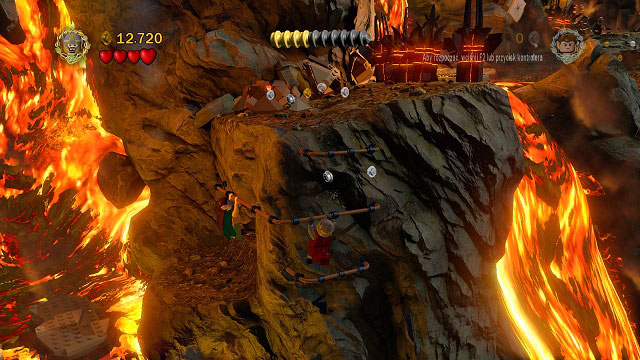 To move onwards, you need to use the rails - just jump onto them (J) and you character will automatically grab onto it - Prologue - Walkthrough - Act I - LEGO The Lord of the Rings - Game Guide and Walkthrough