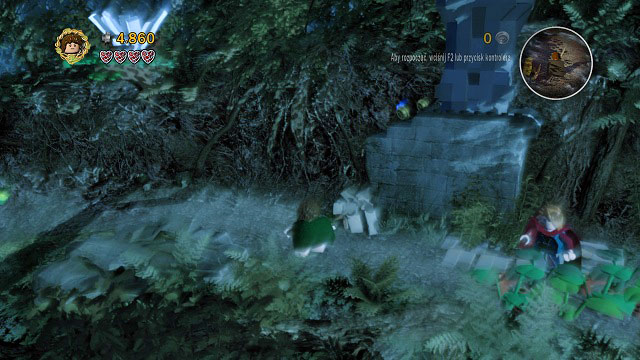 Hit the small boulder by your feet and you will obtain a small rock - use it to knock the phantom LEGO bricks from the branches - Amon Hen - Walkthrough - Act I - LEGO The Lord of the Rings - Game Guide and Walkthrough
