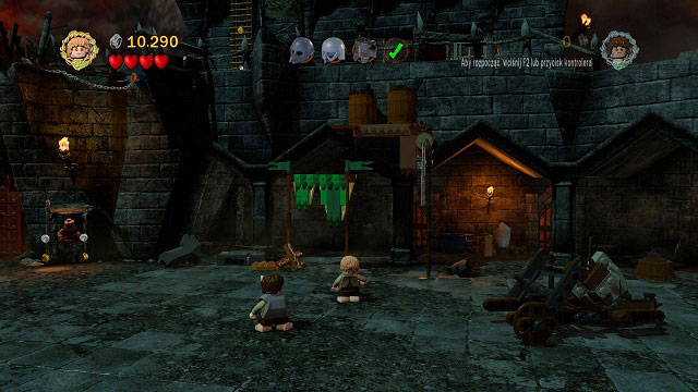 Head further to the right, passing by the entrance gate - Cirith Ungol - Walkthrough - Act III - LEGO The Lord of the Rings - Game Guide and Walkthrough