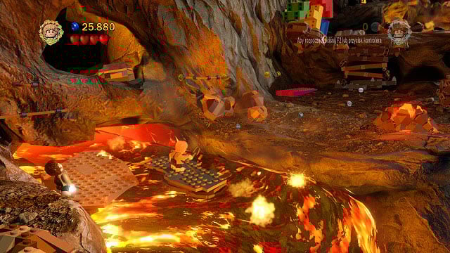 Avoid the fire traps from the prologue and you will reach a rail - Mount Doom - Walkthrough - Act III - LEGO The Lord of the Rings - Game Guide and Walkthrough