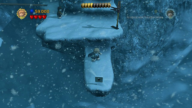 After crossing the bridge, avoid the strong winds and instead of going up the stairs, move towards the camera - The Pass of Caradhras - Collectibles - LEGO The Lord of the Rings - Game Guide and Walkthrough