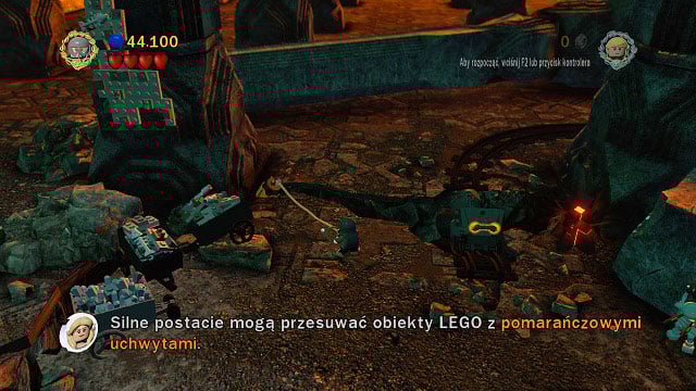 In the location where Balrog is slowly approaching you, you have to destroy a mithril pillar and use the rope on the hook in the ground - The Mines of Moria - Collectibles - LEGO The Lord of the Rings - Game Guide and Walkthrough