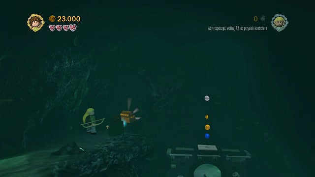 At the end of the second cave, as you're moving along a rock ledge on its right side - The Paths of the Dead - Collectibles - LEGO The Lord of the Rings - Game Guide and Walkthrough