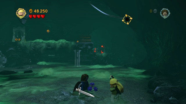 Right above where Minikit #5 was, you can see a target with a rope attached to it - The Paths of the Dead - Collectibles - LEGO The Lord of the Rings - Game Guide and Walkthrough