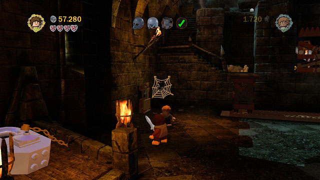 #4 In the upper part of the courtyard, to the left of the Orc controlling the gate mechanism - Cirith Ungol - Collectibles - LEGO The Lord of the Rings - Game Guide and Walkthrough