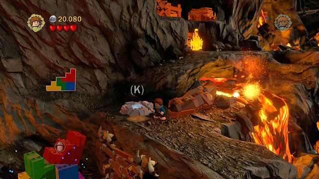 After obtaining Minikit #5, fill up the bucket in the nearby pond and extinguish the fire - Mount Doom - Collectibles - LEGO The Lord of the Rings - Game Guide and Walkthrough