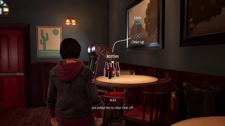 Mac is sitting next to the table with the bottles on it - Life is Strange True Colors: Bar chapter 1 - walkthrough - Life is Strange True Colors: Chapter 1 Side A - Life is Strange True Colors Guide