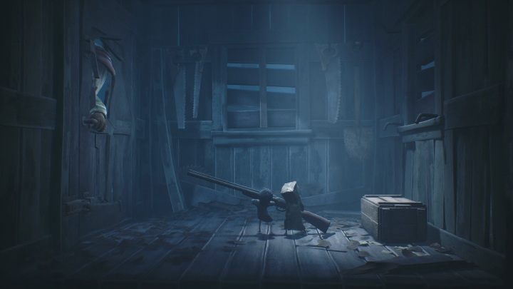 Quickly grab the gun that is lying on the floor - Little Nightmares 2: Escaping the Hunter - Chapter 1 walkthrough - Chapter 1 - Forest - Little Nightmares 2 Guide