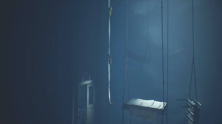 Your task is to jump to the rolled-up bedding, which will serve you as a rope for climbing - Little Nightmares 2: First Floor - Chapter 3 Hospital walkthrough - Chapter 3 - Hospital - Little Nightmares 2 Guide