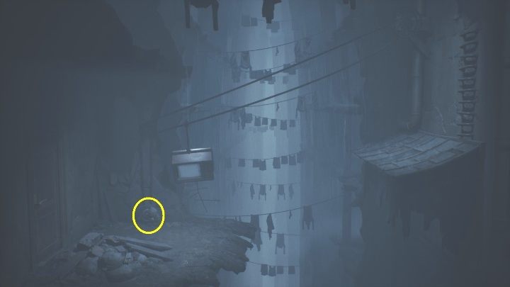 Once you find the blown off part of the room, you will need to move the TV to the left side (so that it hangs over the roof) - Little Nightmares 2: TVs - Chapter 4 walkthrough - Chapter 4 - Getting to the Tower - Little Nightmares 2 Guide