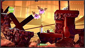 Go past the enemy hitting the ground and climb up the boulders in the background - Where in the World is Avalon Centrifuge - The Cosmos - LittleBigPlanet 2 - Game Guide and Walkthrough