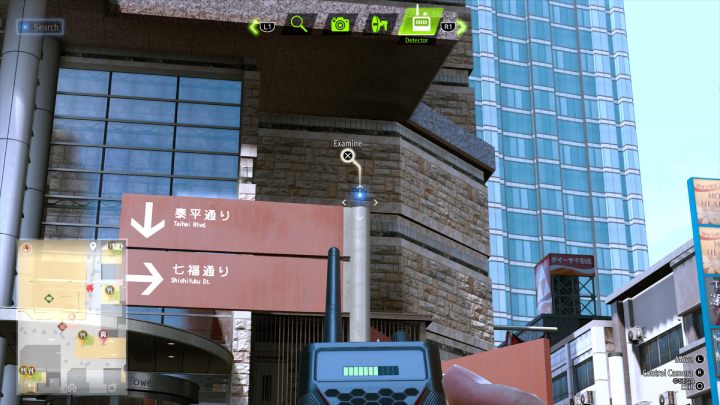 Using the detector, investigate a nearby pole to find the Anime Paint - Lost Judgment: Squirrel search Theater - all squirrels, map - Kamurocho - Lost Judgment Guide