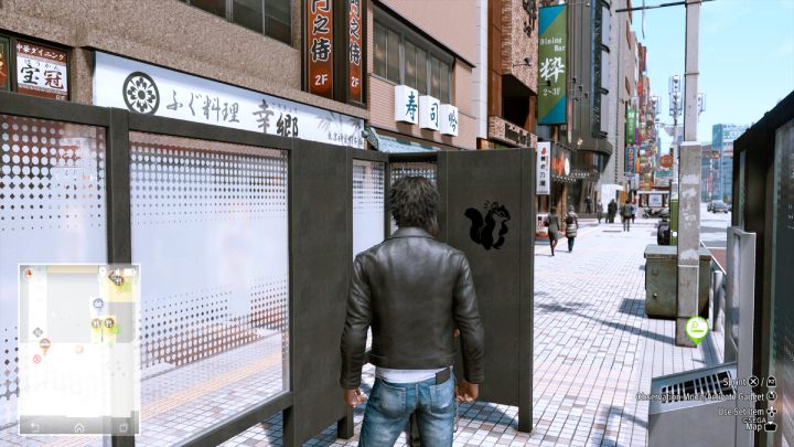 The 52nd image is located on W Showa Street, on the wall of the smoking room - Lost Judgment: Squirrel search Showa Street - all squirrels, map - Kamurocho - Lost Judgment Guide