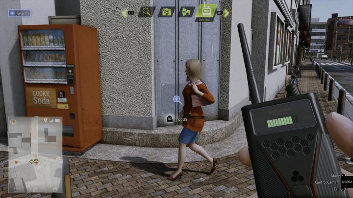 Using the detector, examine the woman in the red sweater - Lost Judgment: Dastardly Detective, The Wandering Bug - walkthrough - Side Cases - Lost Judgment Guide