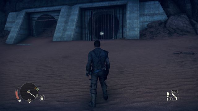 You will find the entrance to the tunnel on the right side, among the rocks. - Ironclad Faith | Wasteland missions - Wasteland missions - Mad Max Game Guide