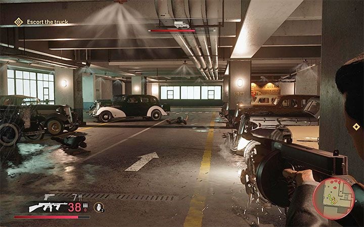 Continue to break through into the lower floors of the parking lot and expect to come across even more enemies - Mafia Definitive Edition: Great Deal - walkthrough - Walkthrough - Mafia Definitive Edition Guide, Walkthrough
